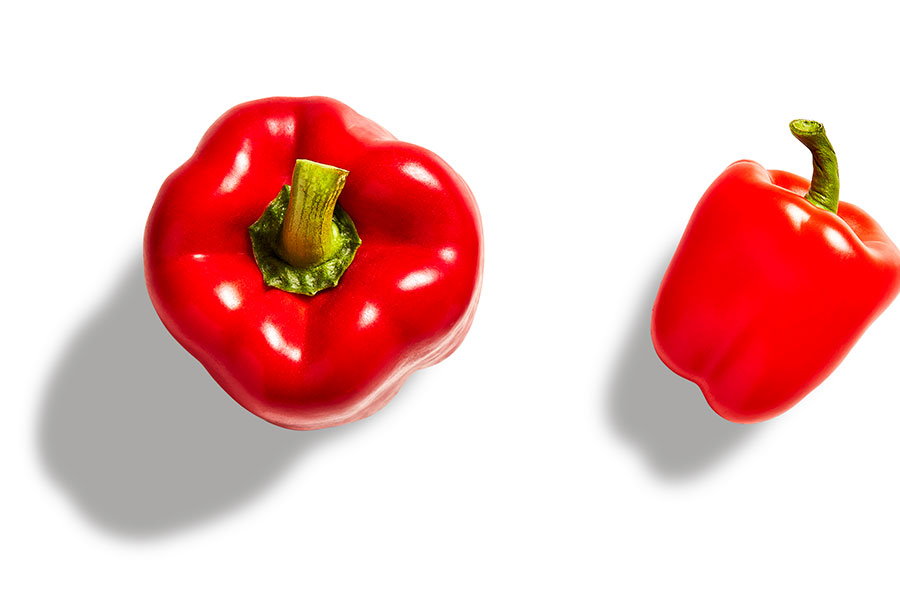 Red bell pepper on a white background.