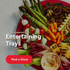 Text Reading 'Get delicious Entertaining trays. 'Learn more' from the button given below.'