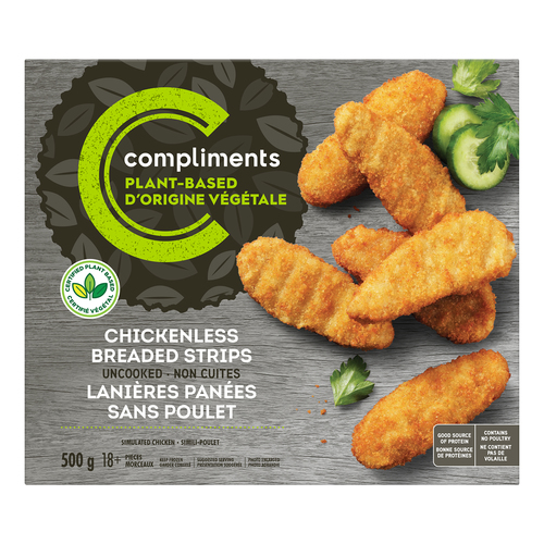 A grey cardboard box of Compliments Plant-Based Chickenless Breaded Strips, with some strips cooked and presented on the front of the box with sliced of fresh cucumber on the side.