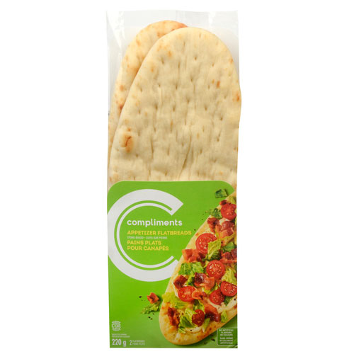 Green and clear package containing two pieces of Compliments Flatbread appetizer