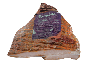 A large deli case–sized Panache Brisket in Texas Mesquite flavour, cryovac wrapped with the purple Panache label on the front.
