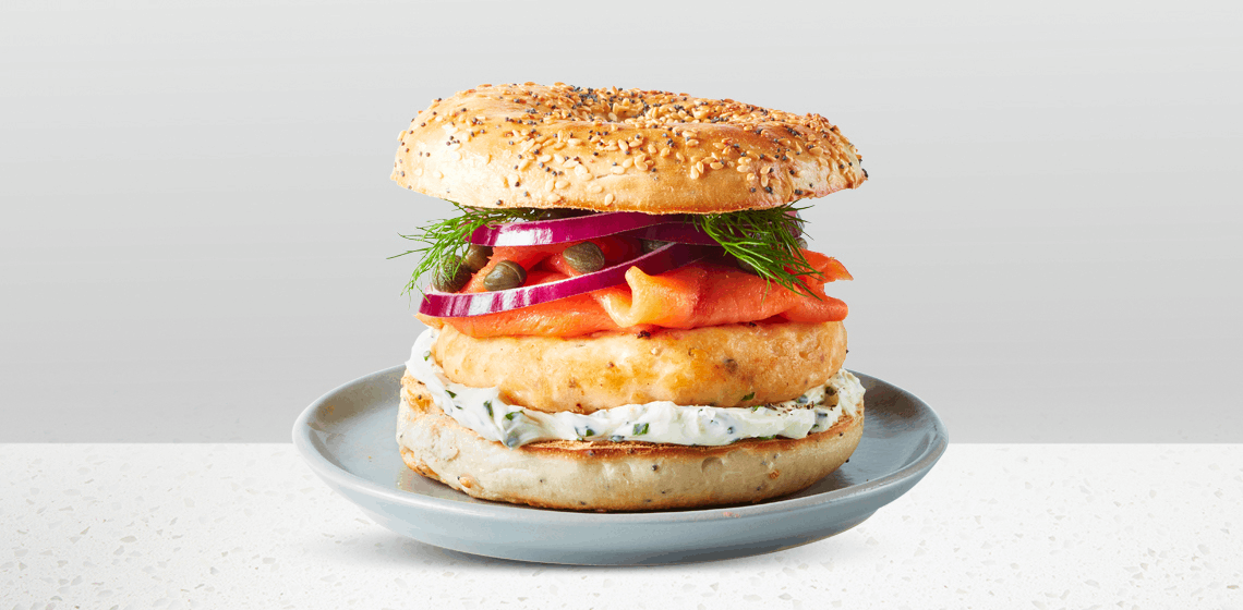 Smoked Salmon Everything Bagel Burgerâ€‹â€‹: fresh sockeye salmon burger with smoked salmon, herbed cream cheese, red onion, capers, and dill.â€‹â€‹